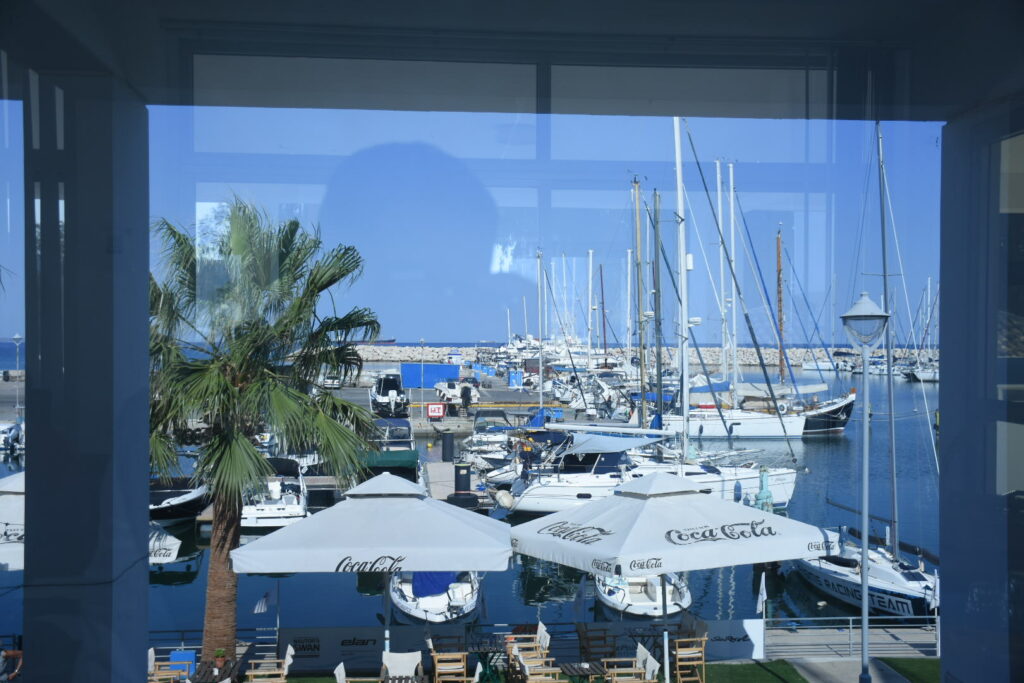 The view from the conference room featuring Larnaca Marina and boats